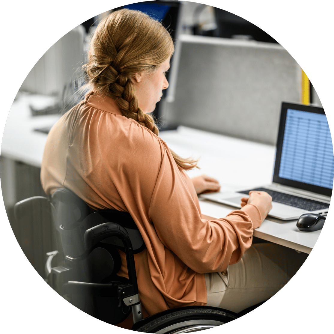 An office worker reviewing a spreadsheet