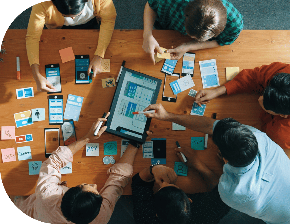 Five coworkers around a table