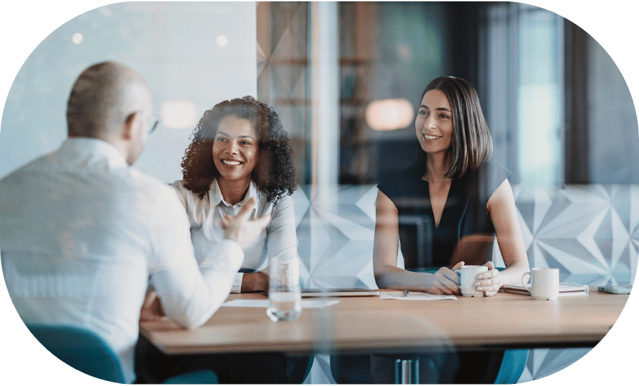 Three coworkers having a meeting