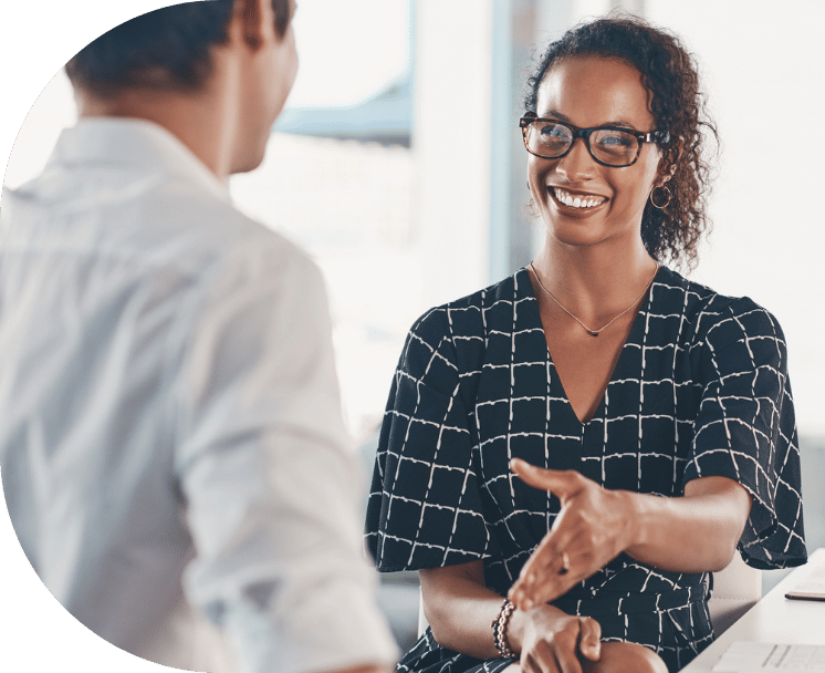 Two coworkers shaking hands