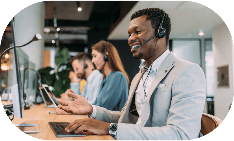 A man answering calls on a headset